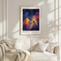 a framed poster of a colorful illustration of a person in a religious scene, hanging on a wall above a white couch.