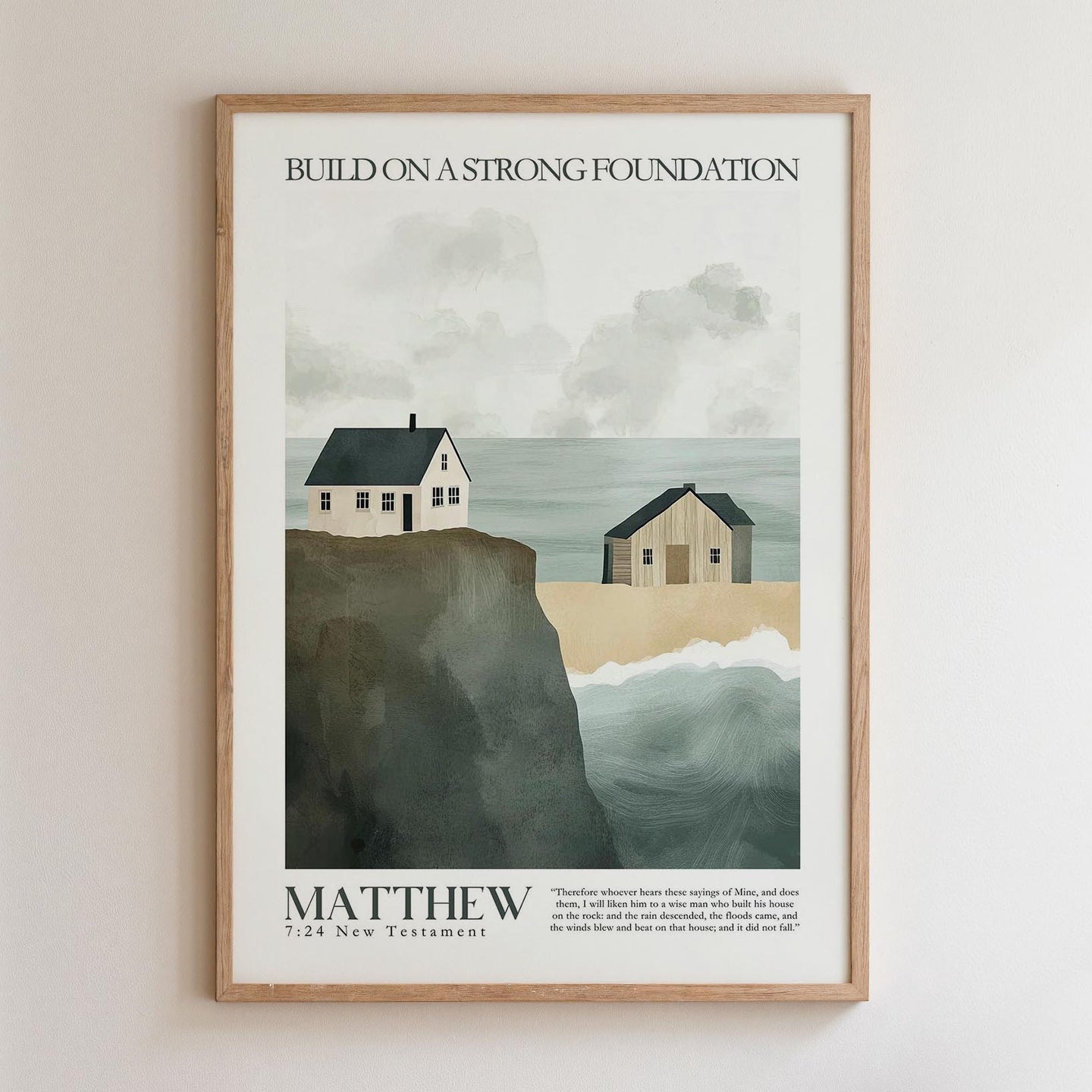 The image is a framed poster with a coastal scene featuring two houses on a cliff overlooking the ocean. The poster has a minimalist design with a focus on the houses and the ocean.