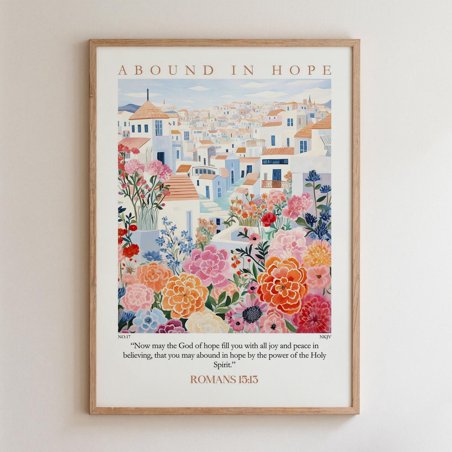 The image is a framed poster with a colorful illustration of a cityscape filled with flowers and buildings. The poster is titled "ABOUND IN HOPE" and includes a Bible verse from Romans 15:15.