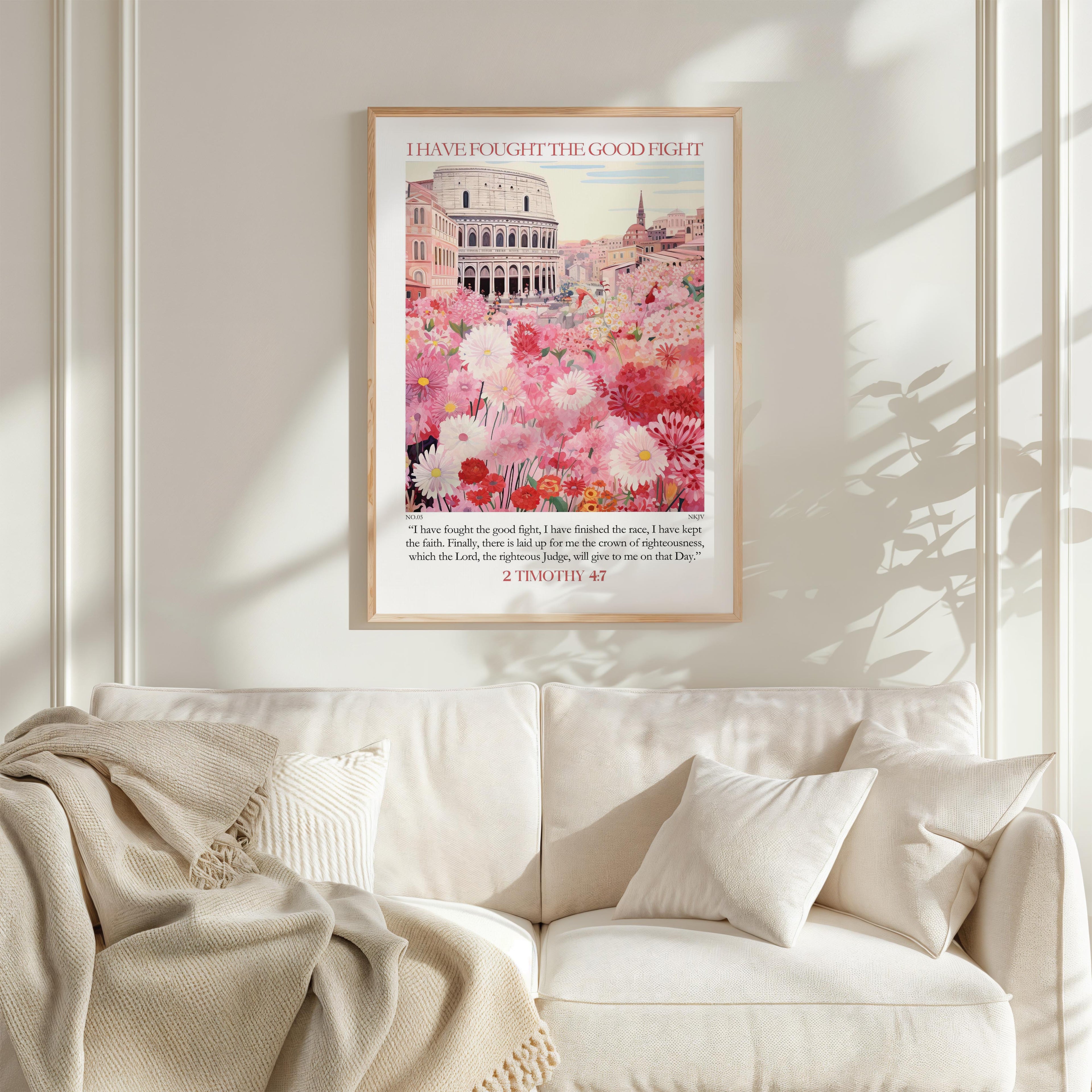 a framed poster of a cityscape with a large building and a field of flowers, hanging on a wall above a white couch with pillows.