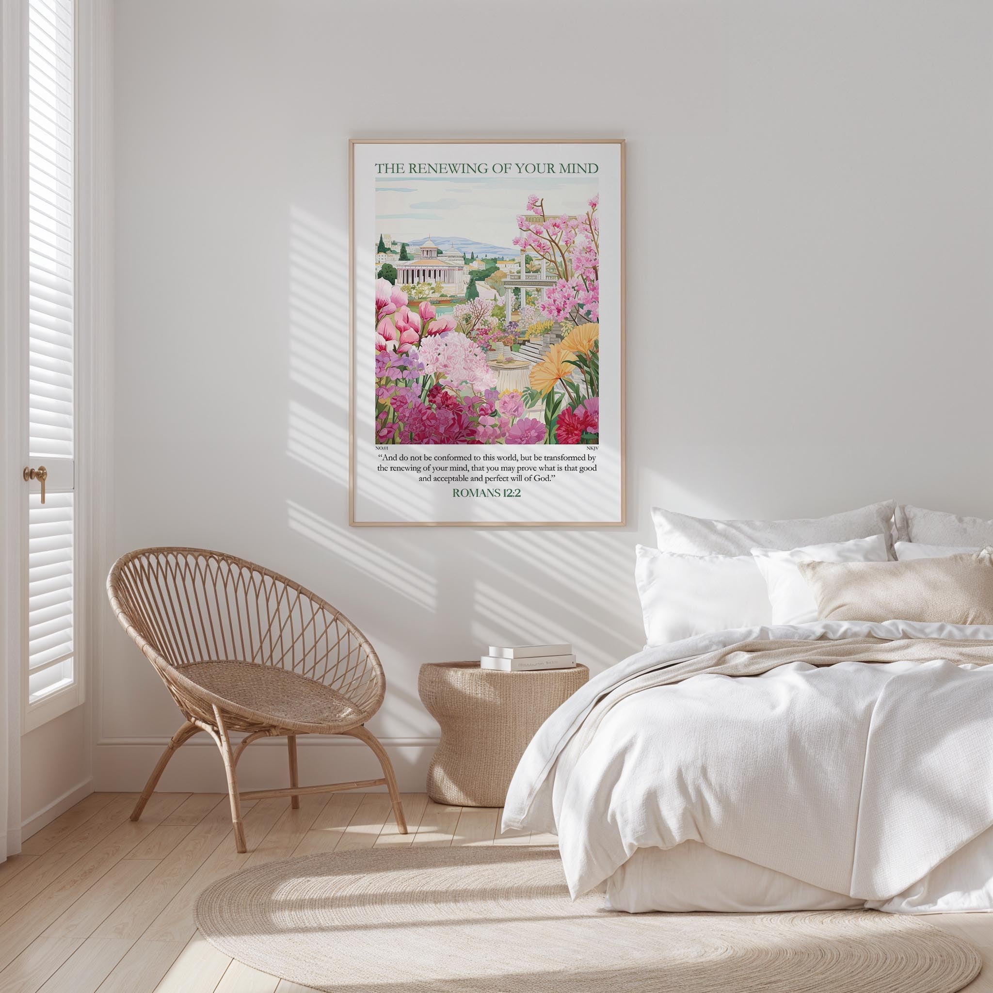 a bedroom with a bed, a wicker chair, and a framed poster of a garden on the wall.