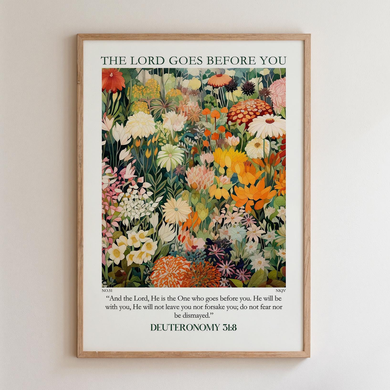 The image is a framed poster with a vibrant floral scene and a biblical verse from the book of Deuteronomy.