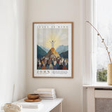 A framed poster of Jesus Christ is hanging on a wall, with a window and a small table with books and a bowl on it below.