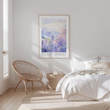 a serene bedroom scene with a large poster of a landscape hanging on the wall, a woven chair, and a neatly made bed with white linens.