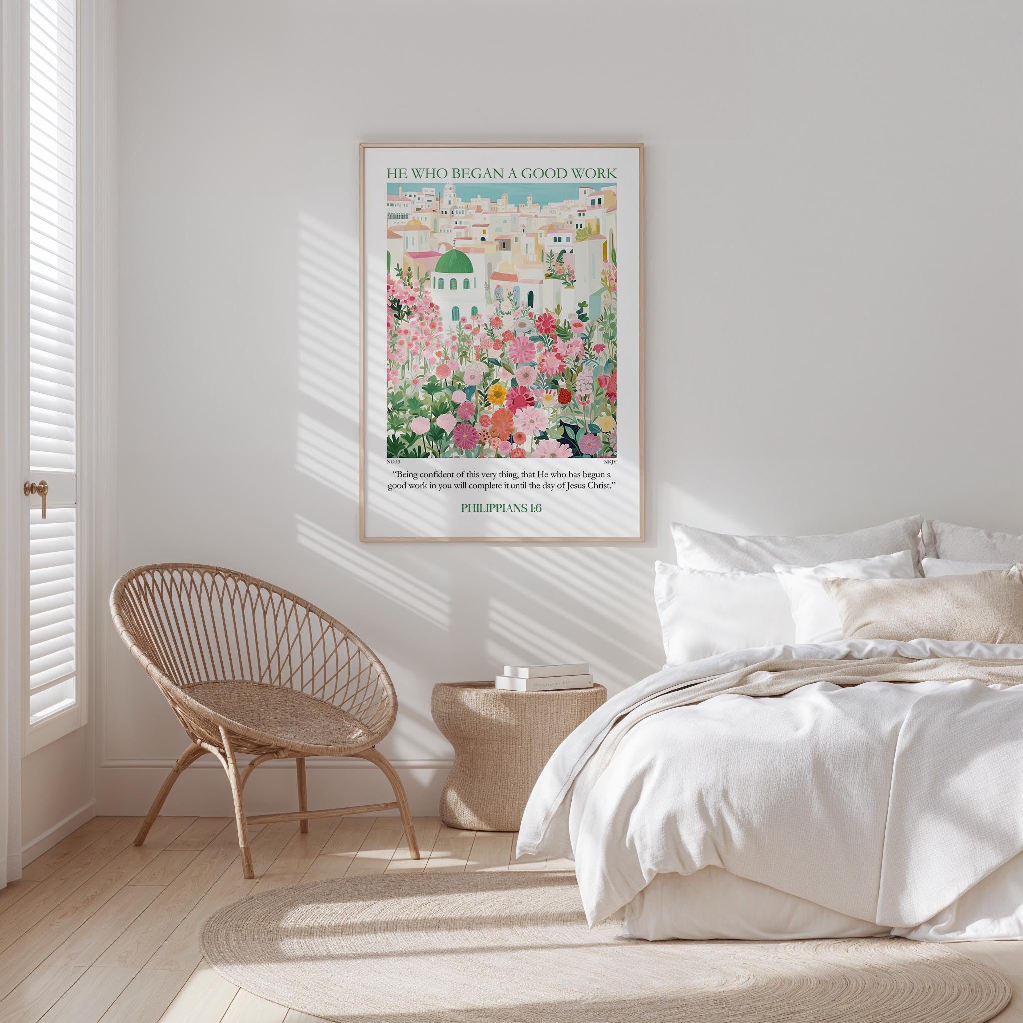 a bedroom with a bed, a woven chair, and a framed poster on the wall.