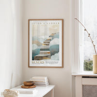 A framed poster of a staircase leading to clouds hangs on a wall in a room with a white table and a vase of flowers.