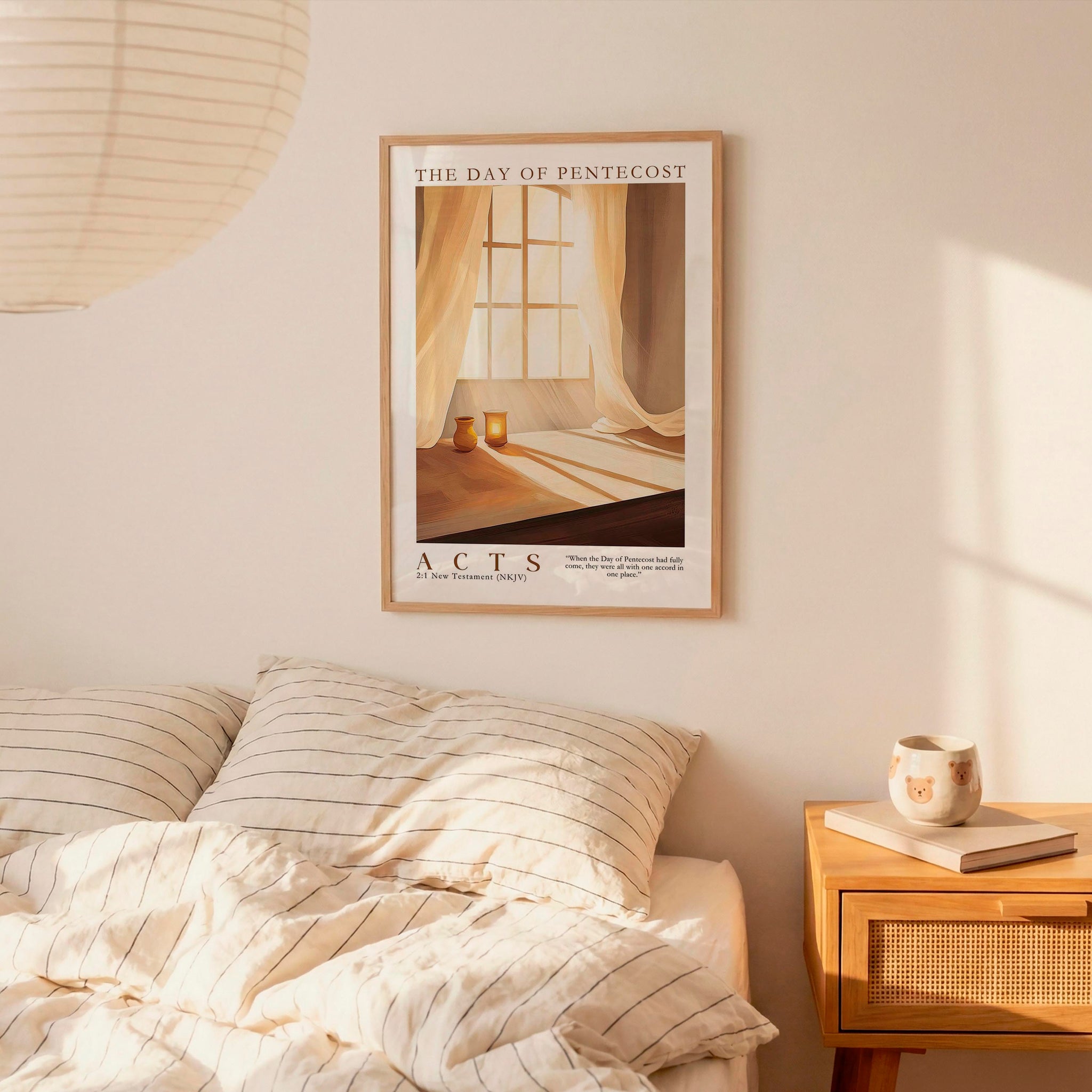 a bedroom scene with a framed poster of a window and curtains hanging on the wall above a bed with striped bedding.