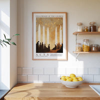 a framed poster of silhouettes of people in a church, hanging on a wall above a wooden counter with a bowl of lemons.