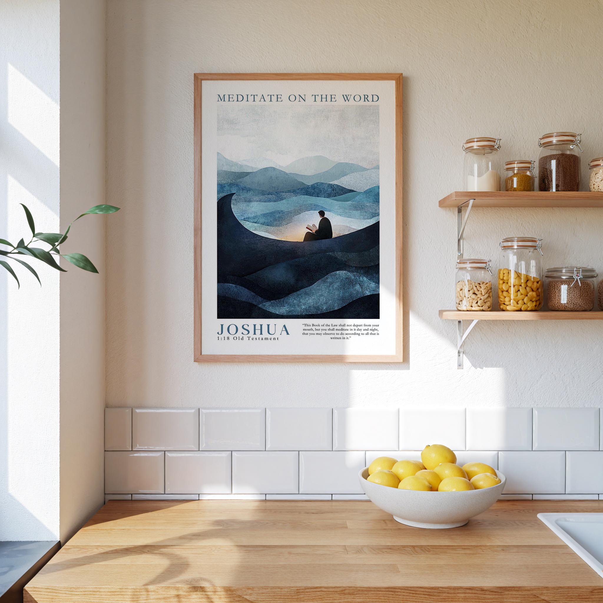 a framed poster of a person meditating on a mountain, with a bowl of lemons and a shelf of jars nearby.