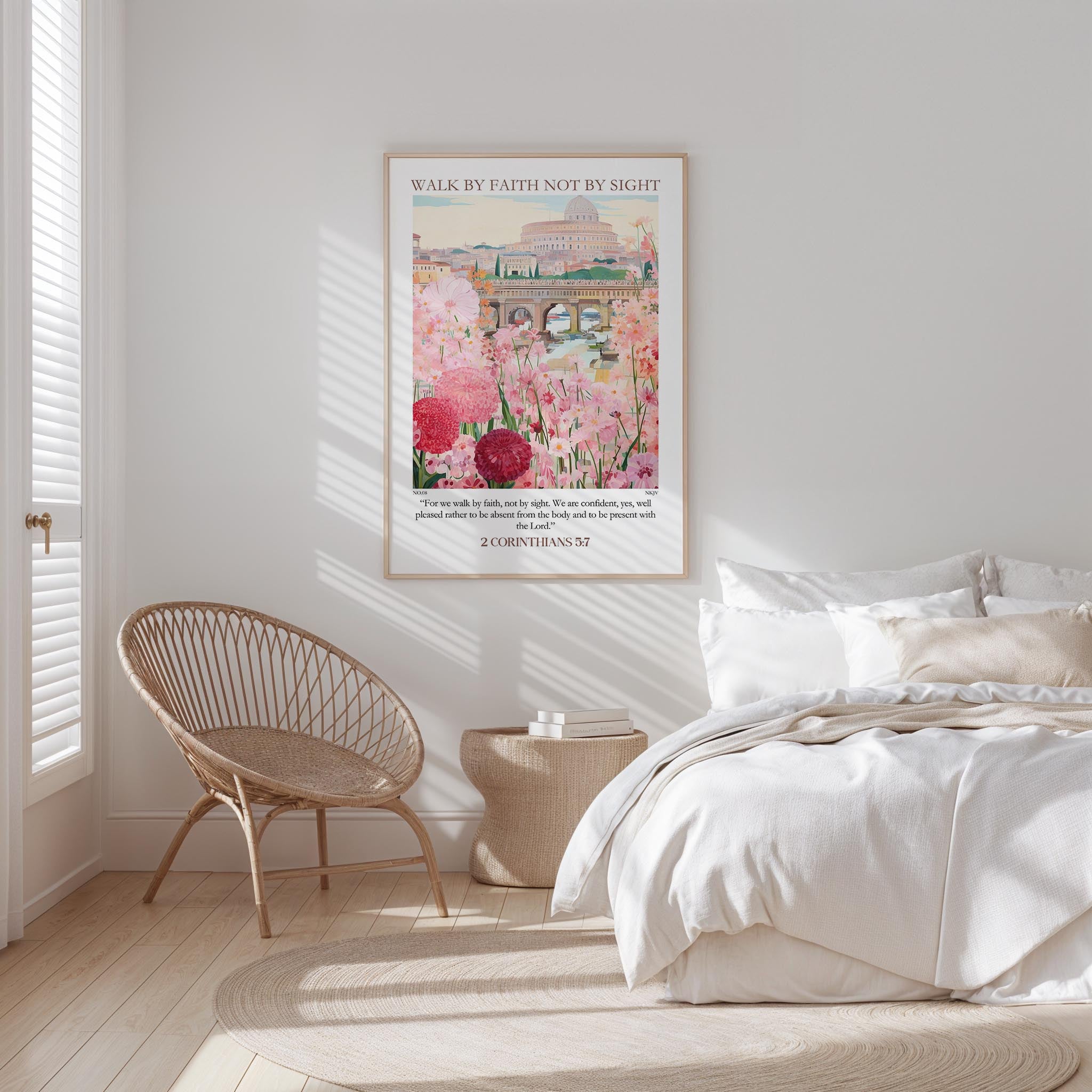a bedroom with a bed, a wicker chair, and a framed poster on the wall.