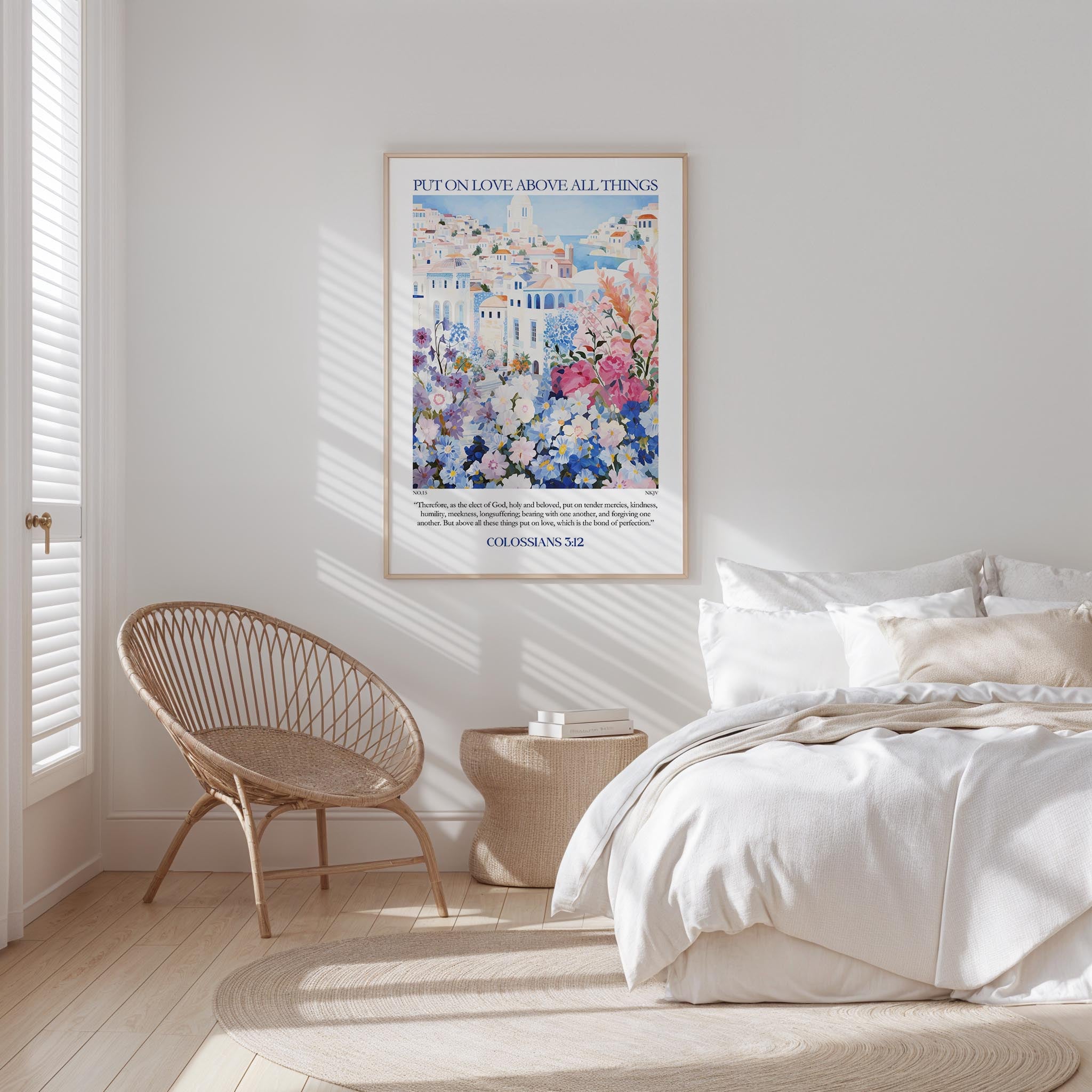 A bedroom with a large bed, a woven chair, and a framed poster of a colorful floral scene on the wall.