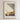 The image is a framed poster with a serene scene of bread and a plant, accompanied by a quote from the Bible about Jesus being the bread of life.