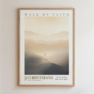 The image is a framed poster with a landscape scene depicting a lone figure walking through a misty, mountainous terrain. The poster is titled "WALK BY FAITH" and includes a Bible verse from 2 Corinthians 5:7, which reads "For we walk by faith, not by sight."