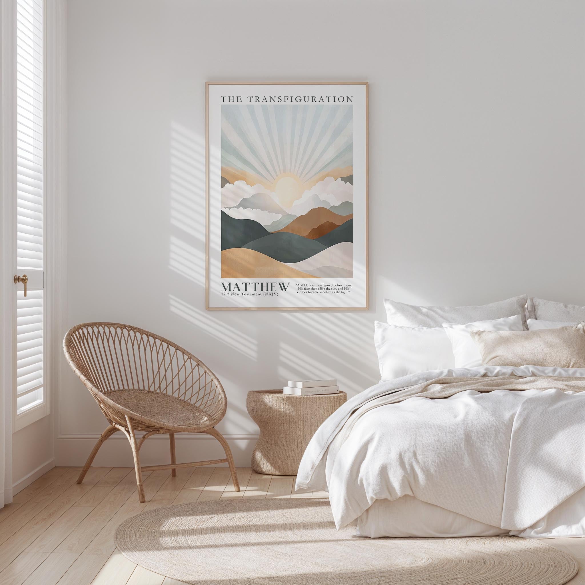 A bedroom with a large bed, a woven chair, and a framed poster of a mountain landscape with a sunburst design.