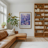 A cozy living room with a brown leather sofa, a large window, a bookshelf filled with books, and a framed poster of a purple floral design hanging on the wall.