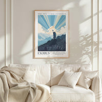 a poster of the Ten Commandments hanging on a wall above a white couch with a blanket draped over it.