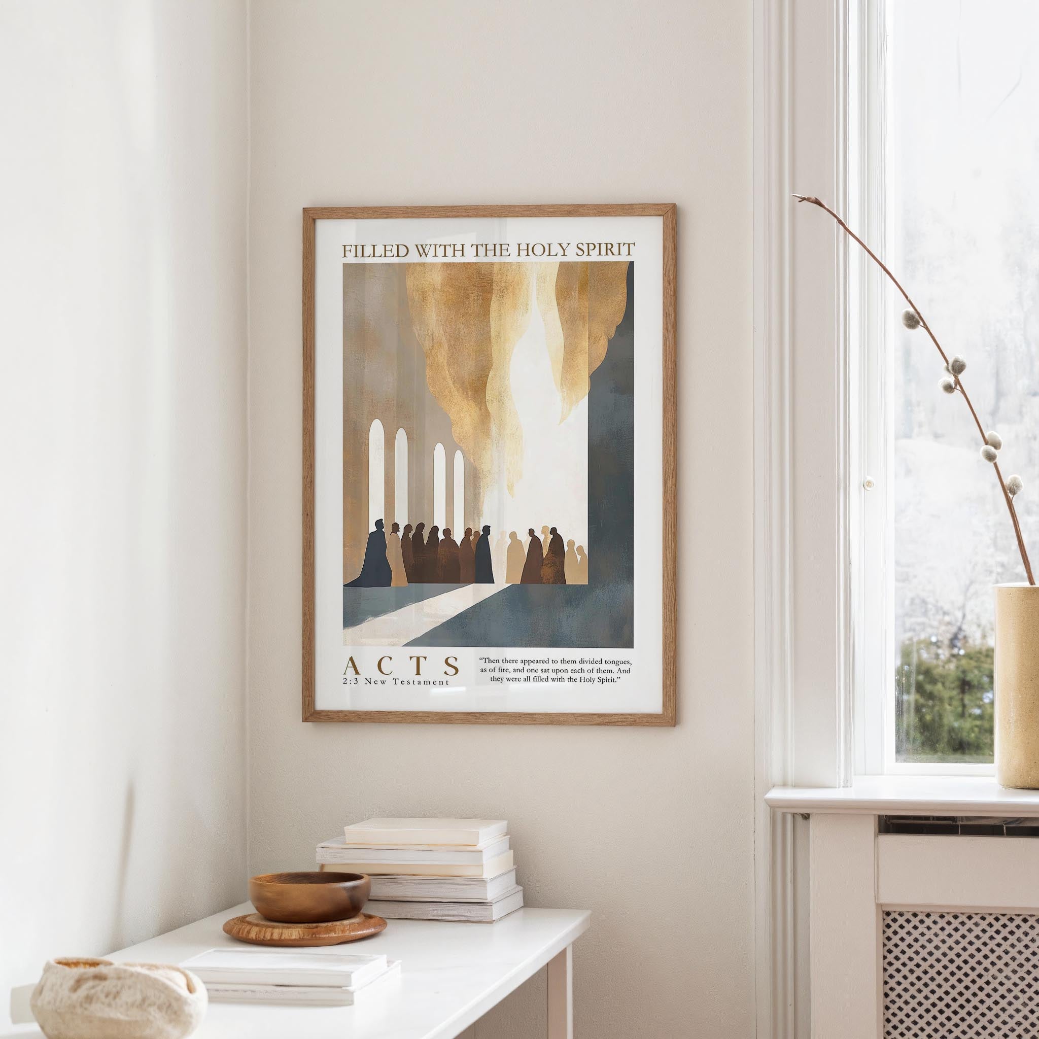a framed poster of a religious scene hanging on a wall, with a white table and a vase of flowers in the foreground.