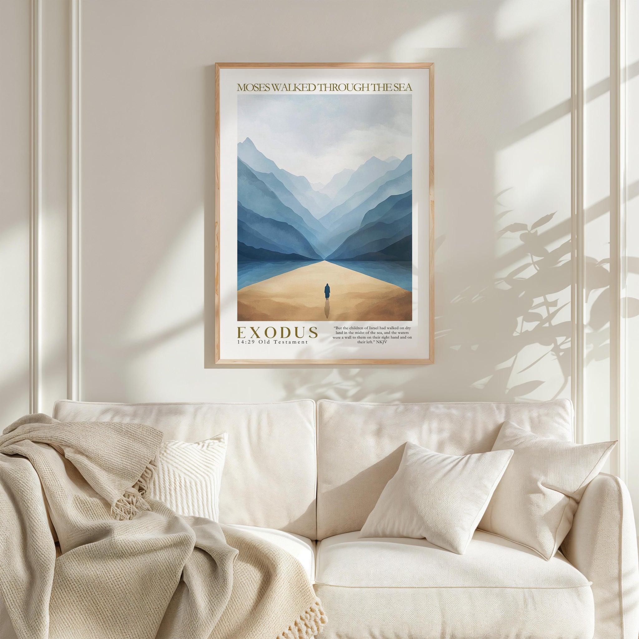a framed poster of a person walking through a mountainous landscape, with the text "Moses walked through the sea" and "Exodus 14:17-21" visible.