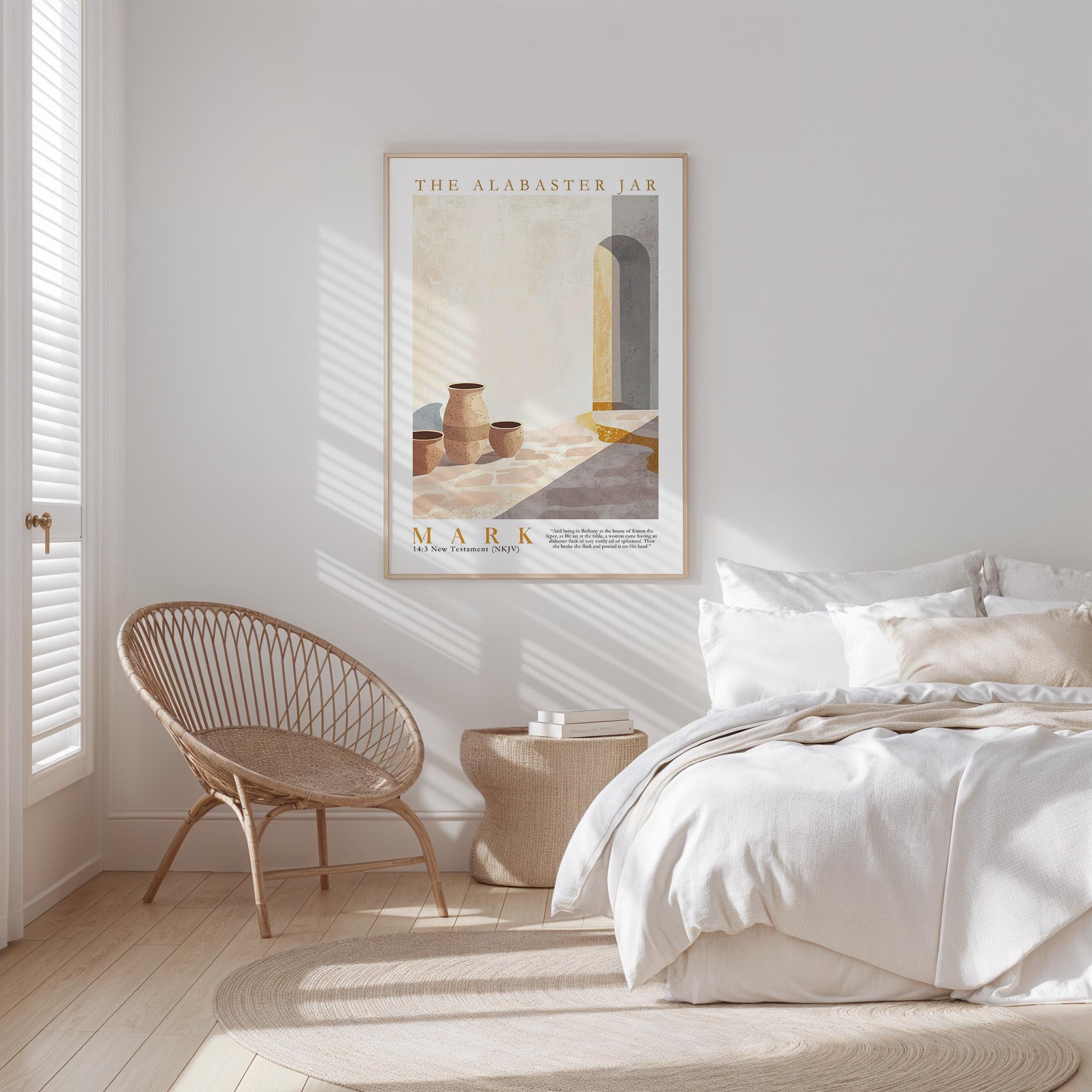 a serene bedroom scene with a bed, a woven chair, and a framed poster on the wall.