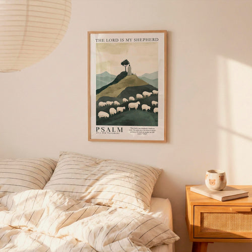 a bedroom scene with a framed poster of a pastoral landscape hanging on the wall above a bed with striped bedding.