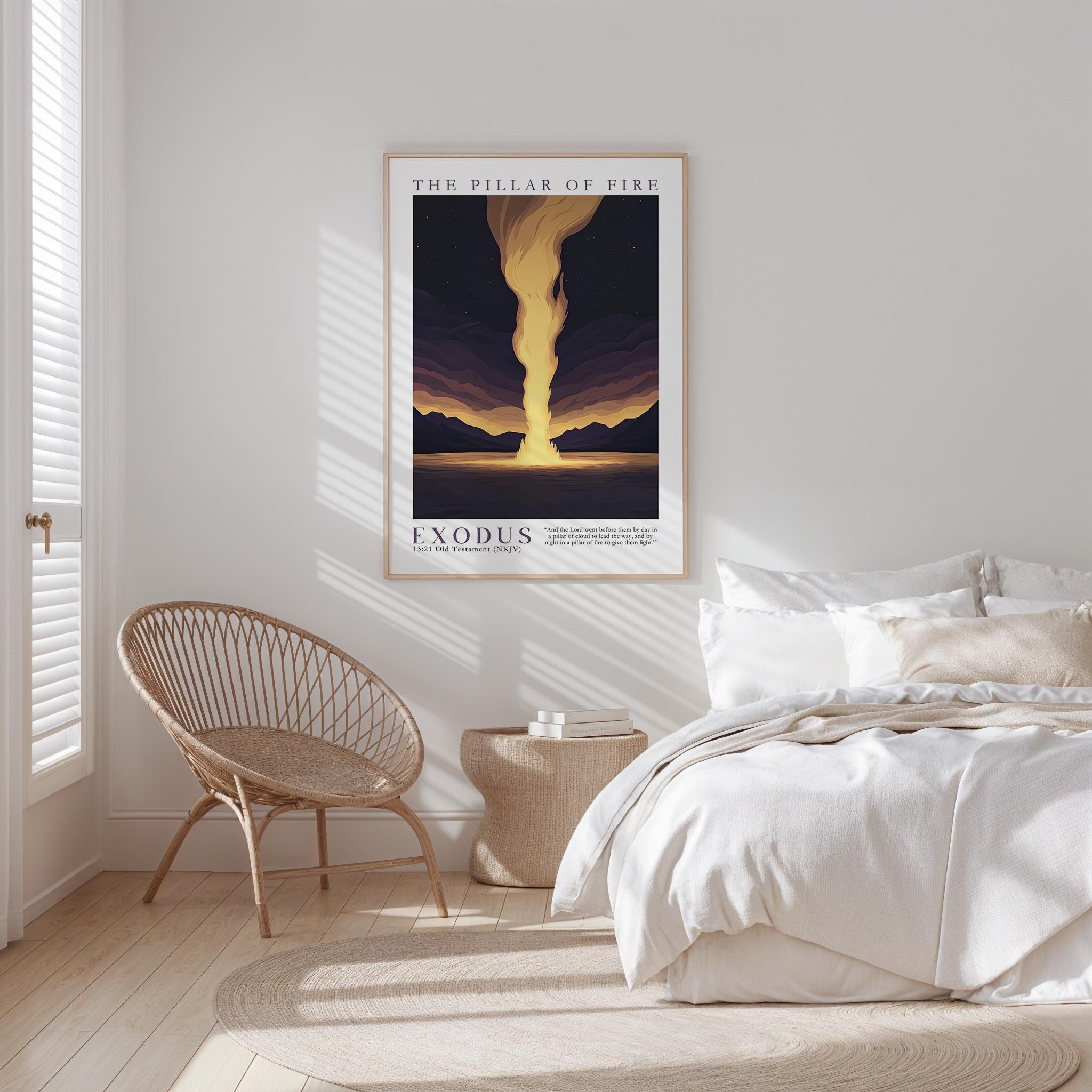a bedroom with a bed, a woven chair, and a framed poster of a sunset over a mountain landscape.
