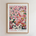 The image is a framed poster with a vibrant floral design.
