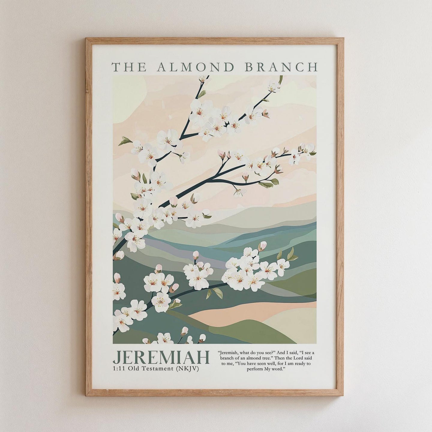 The image is a framed poster featuring a floral design with white flowers against a background of green hills and mountains. The poster is titled "The Almond Branch" and includes a biblical verse from the book of Jeremiah.