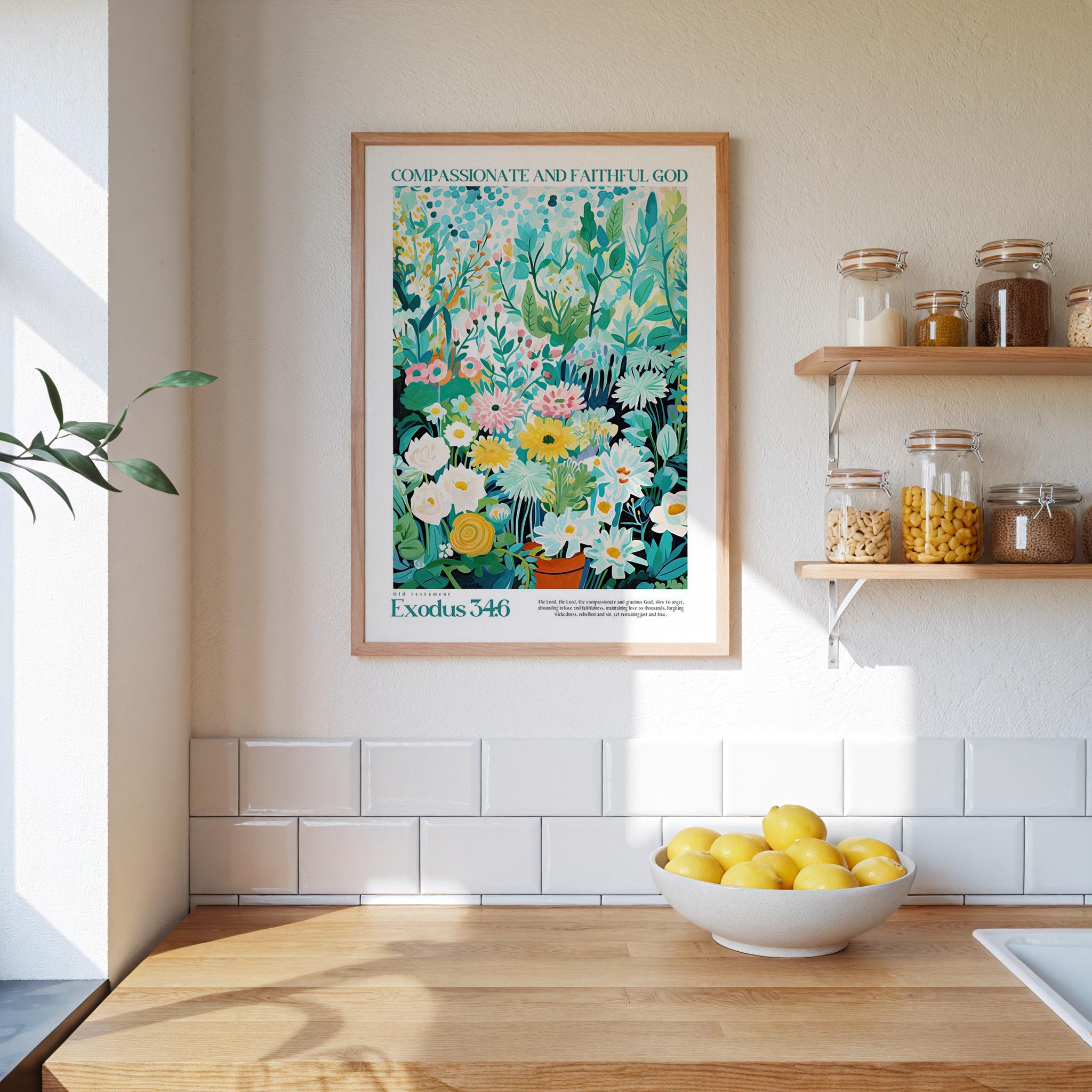 a kitchen scene with a framed poster of a colorful garden hanging on the wall above a wooden countertop with a bowl of lemons.