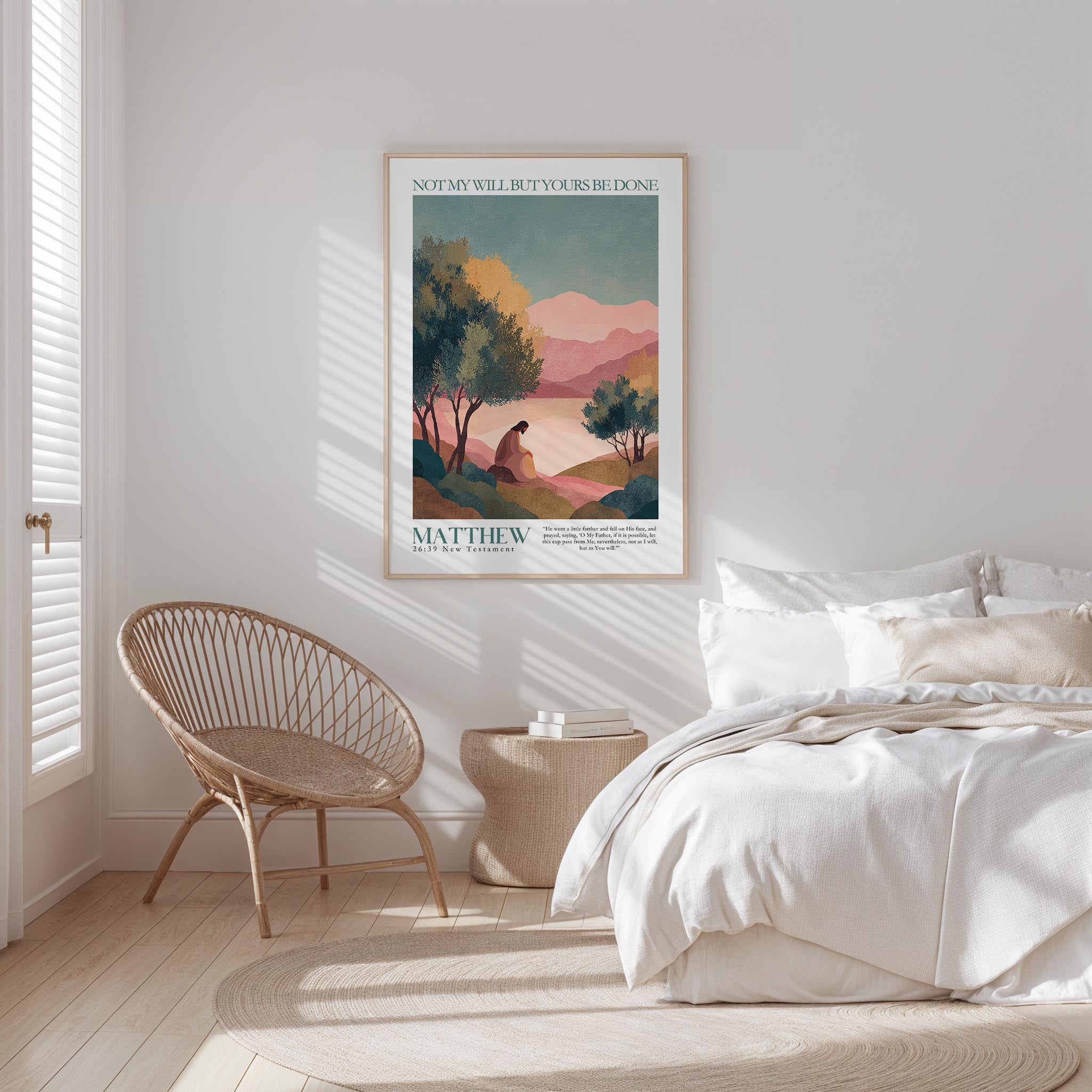 a bedroom with a large bed, a woven chair, and a framed poster of a landscape on the wall.