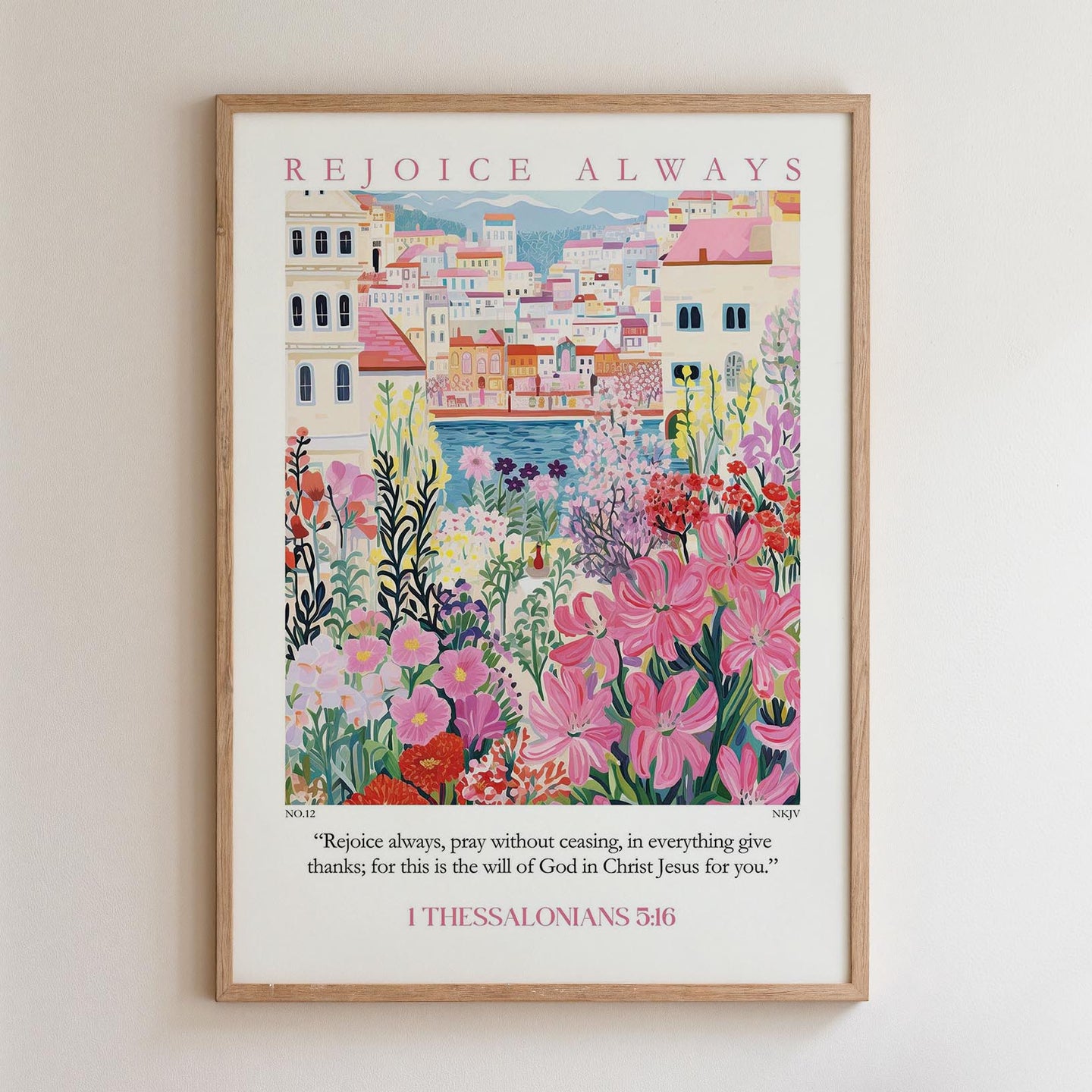 The image is a framed poster with a colorful illustration of a cityscape and flowers. The poster has a religious message and a Bible verse from 1 Thessalonians 5:16.