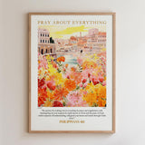 The image is a framed poster with a vibrant illustration of a cityscape filled with colorful flowers. The poster has a religious message and a Bible verse from Philippians 4:6.