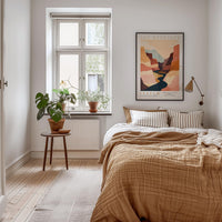 a cozy bedroom with a large bed, a wooden nightstand, and a window with a plant on it. The room has a warm, inviting atmosphere with a neutral color palette and natural elements like the potted plant and the rug.