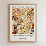The image is a framed poster with a floral design and a Bible verse from Ephesians 6:11.