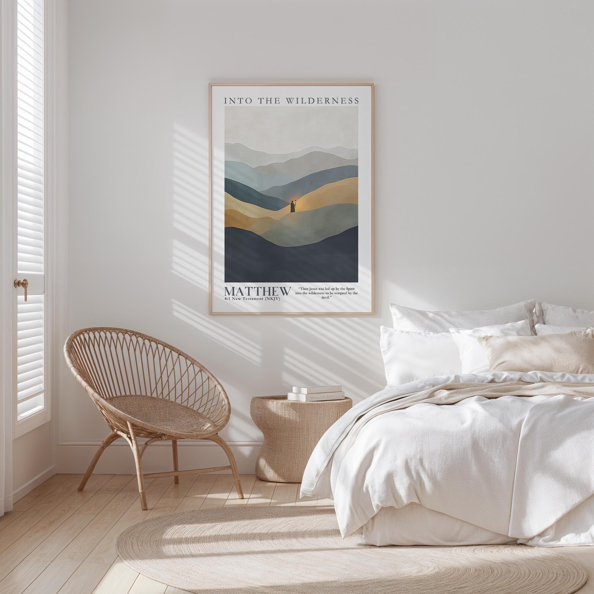 a serene bedroom scene with a large bed, a woven chair, and a framed poster of a mountain landscape.