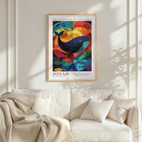 a vibrant, abstract painting of a whale, which is hanging on a wall above a white couch.