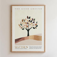 The image is a framed poster with a tree design and a Bible verse from Matthew 13:23.