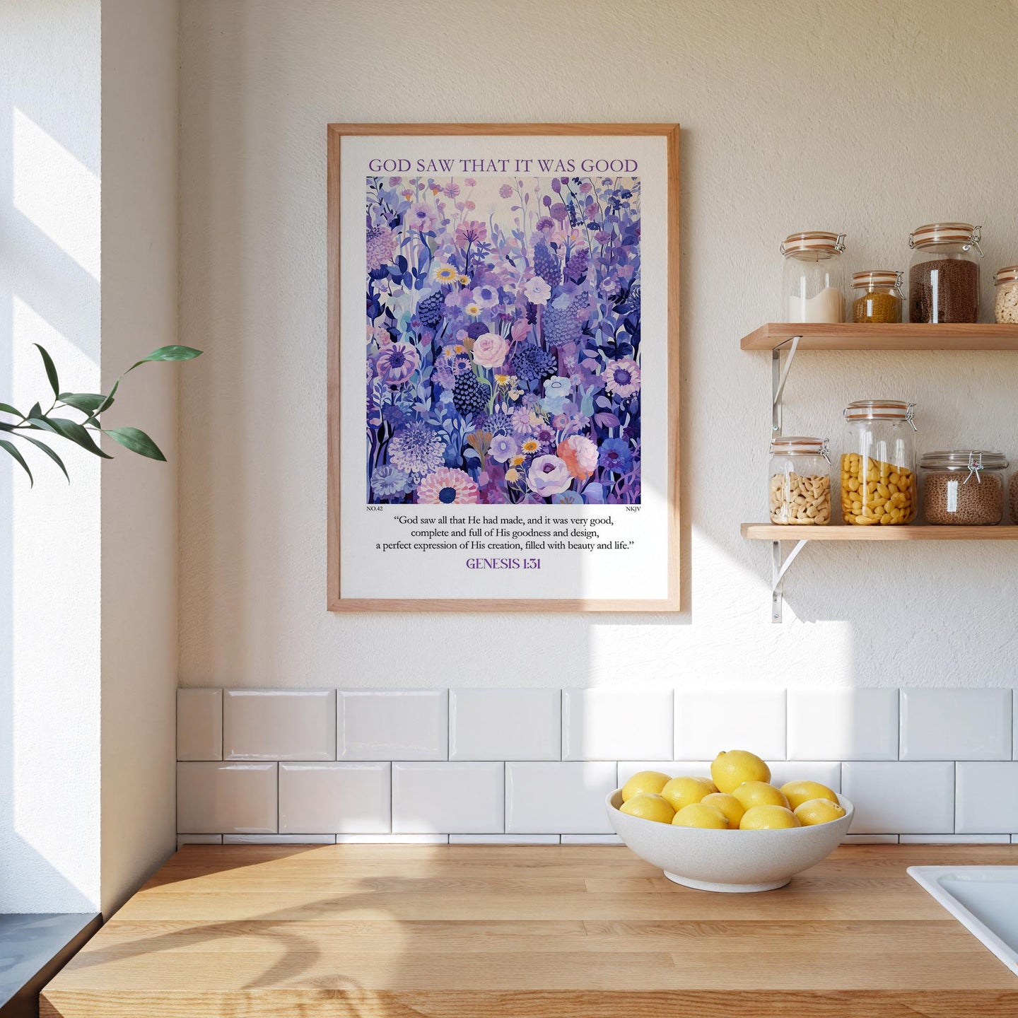 a kitchen scene with a framed poster of a colorful floral design hanging on the wall above a wooden countertop with a bowl of lemons.