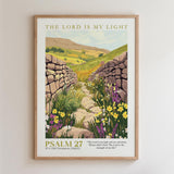 The image is a framed poster depicting a stone path leading through a lush, green landscape with flowers and grass. The text on the poster reads "THE LORD IS MY LIGHT" and "PSALM 27: 1:1 OLD TESTAMENT ( NKJV )".