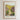 The image is a framed poster depicting a stone path leading through a lush, green landscape with flowers and grass. The text on the poster reads "THE LORD IS MY LIGHT" and "PSALM 27: 1:1 OLD TESTAMENT ( NKJV )".