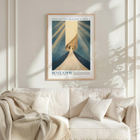 a framed poster of a spiral design hanging on a wall above a white couch with a blanket draped over it.