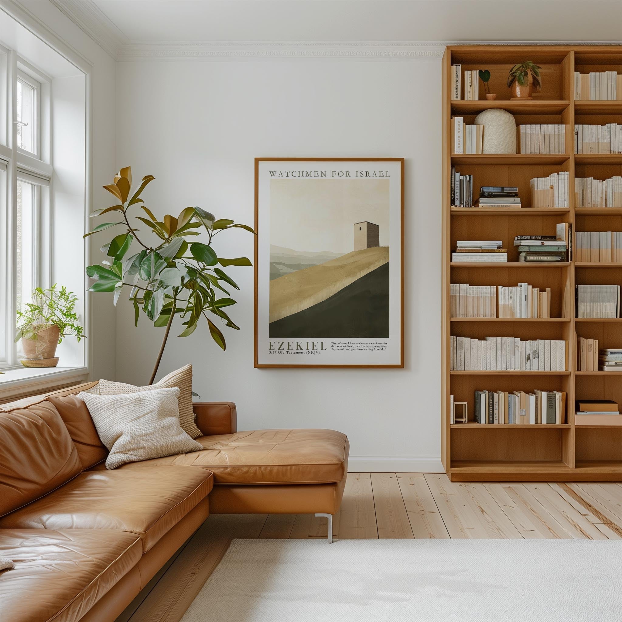 a cozy living room with a large bookshelf filled with books, a comfortable leather sofa, and a framed poster of a desert landscape.