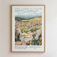 The image is a framed poster depicting a pastoral scene with a stone wall, flowers, and mountains in the background. The text on the poster reads "THE LORD IS GOOD" and "PSALM 34: 34-Old Testament ( NKJV )".