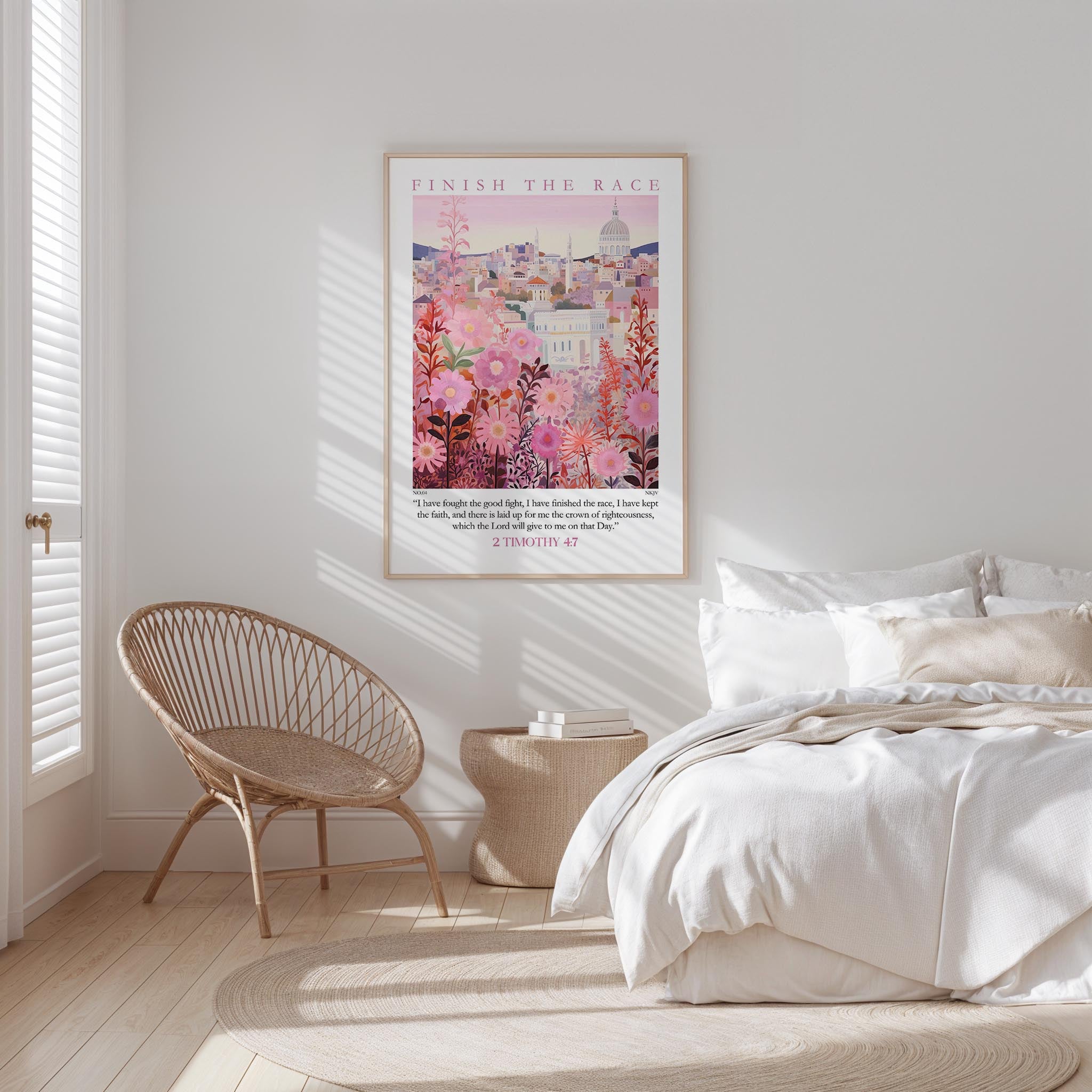 a bedroom with a bed, a woven chair, and a framed poster of a cityscape with pink flowers hanging on the wall.