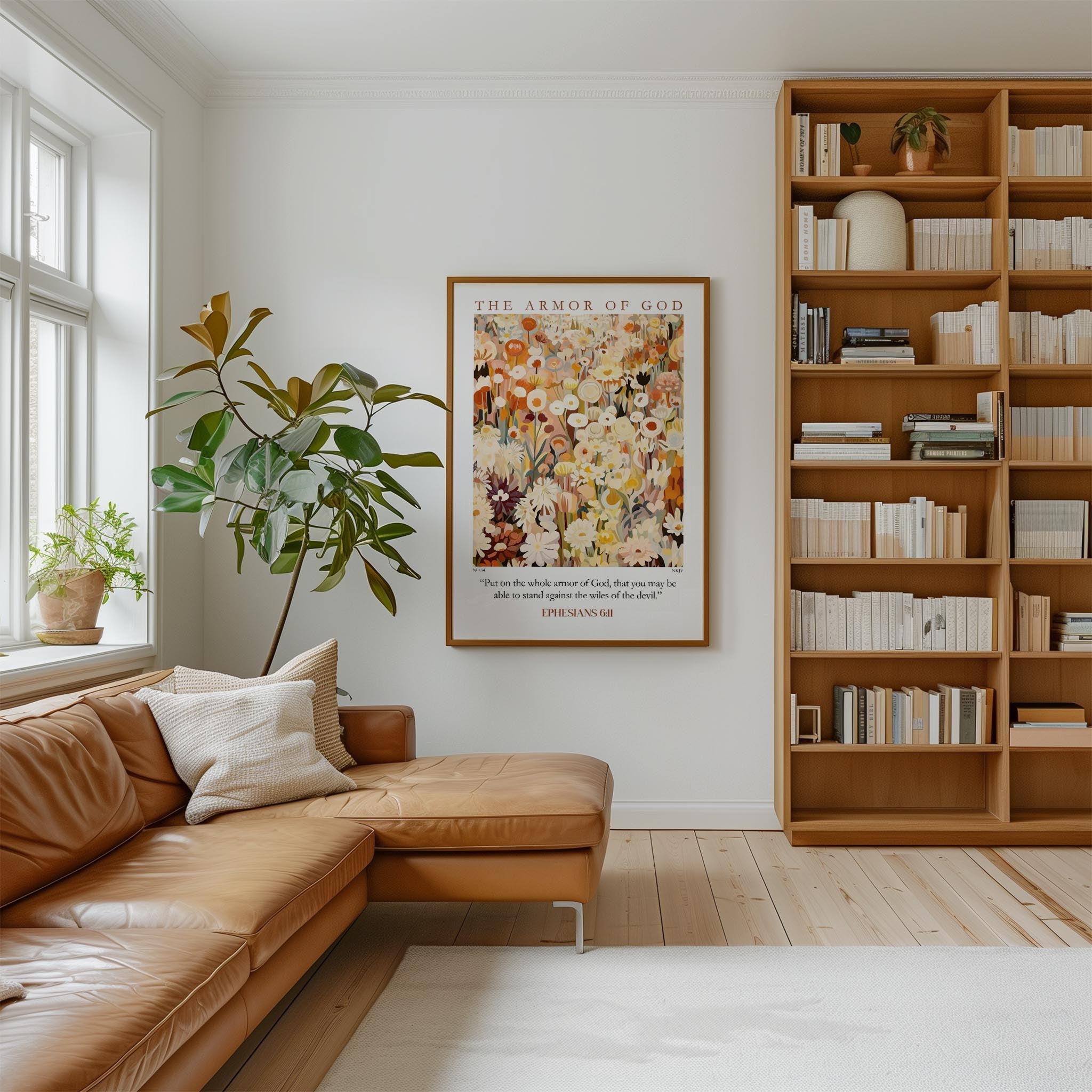 a cozy living room with a brown leather sofa, a large bookshelf filled with books, and a framed poster on the wall.