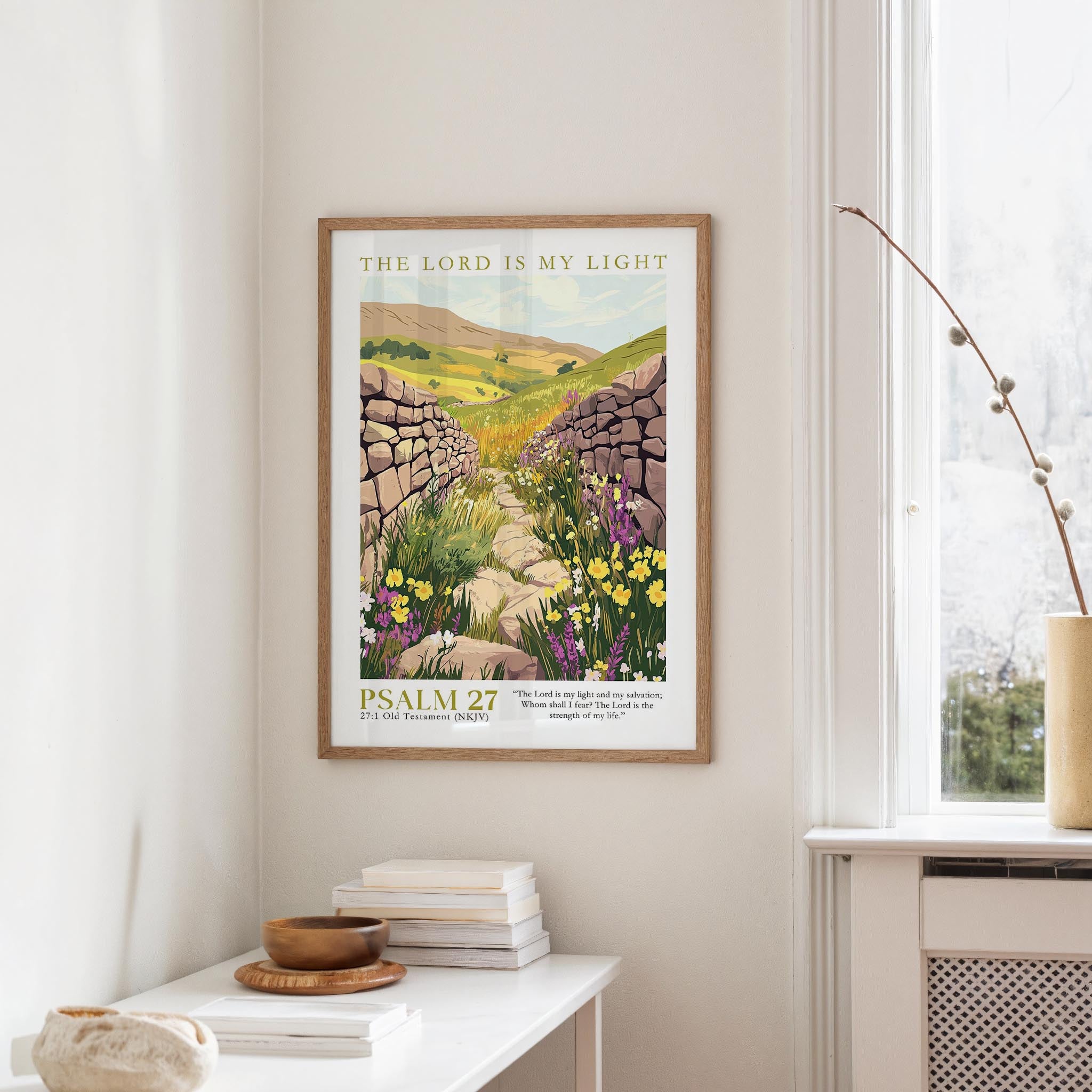 a framed poster of a stone path leading through a field of flowers, with the text "THE LORD IS MY LIGHT" and "PSALM 27" below it.