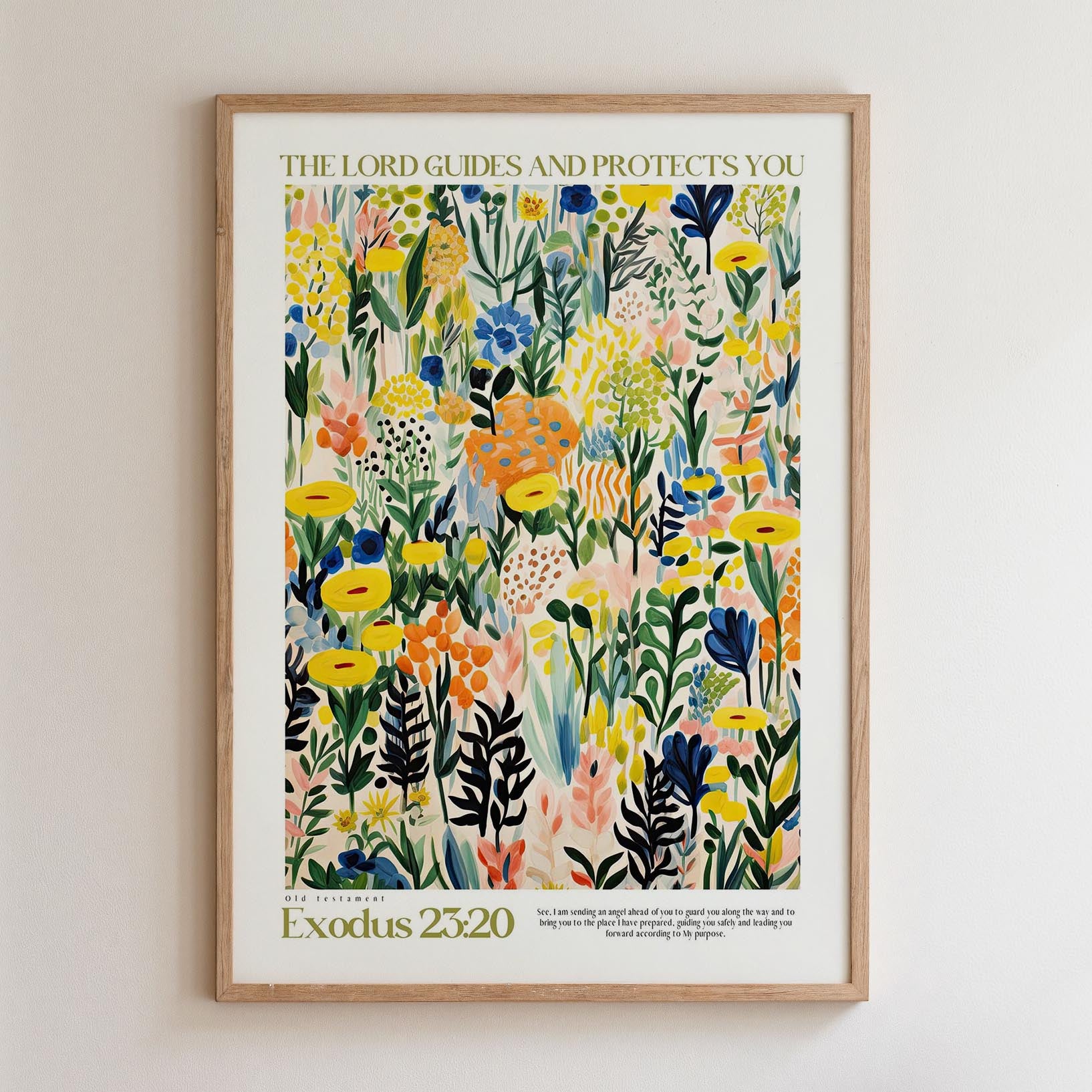 The image is a framed poster featuring a vibrant, colorful illustration of various flowers and plants. The poster is titled "The Lord Guides and Protects You" and includes the text "Old Testament Exodus 23:20".