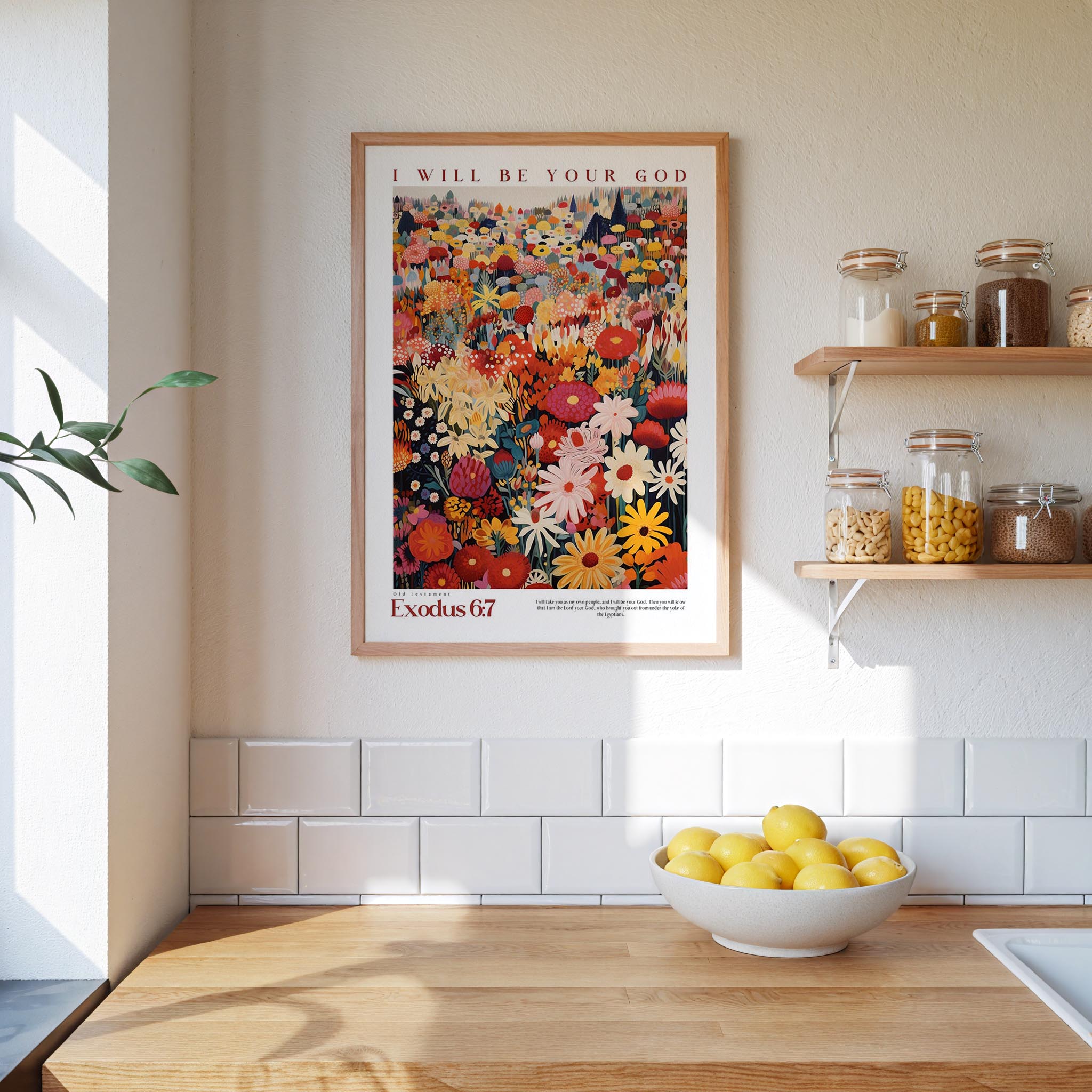 a kitchen scene with a framed poster of a colorful floral design hanging on the wall above a wooden countertop with a bowl of lemons.