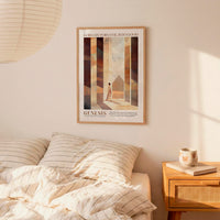 a bedroom setting with a bed, a nightstand, and a poster on the wall. The poster is a framed artwork depicting a person walking through a hallway.