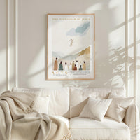 a poster of a religious scene with a group of people, and it is hanging on a white wall above a white couch.