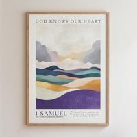 The image is a framed poster with a landscape scene depicting mountains and hills. The poster has a quote from 1 Samuel about God knowing our hearts.